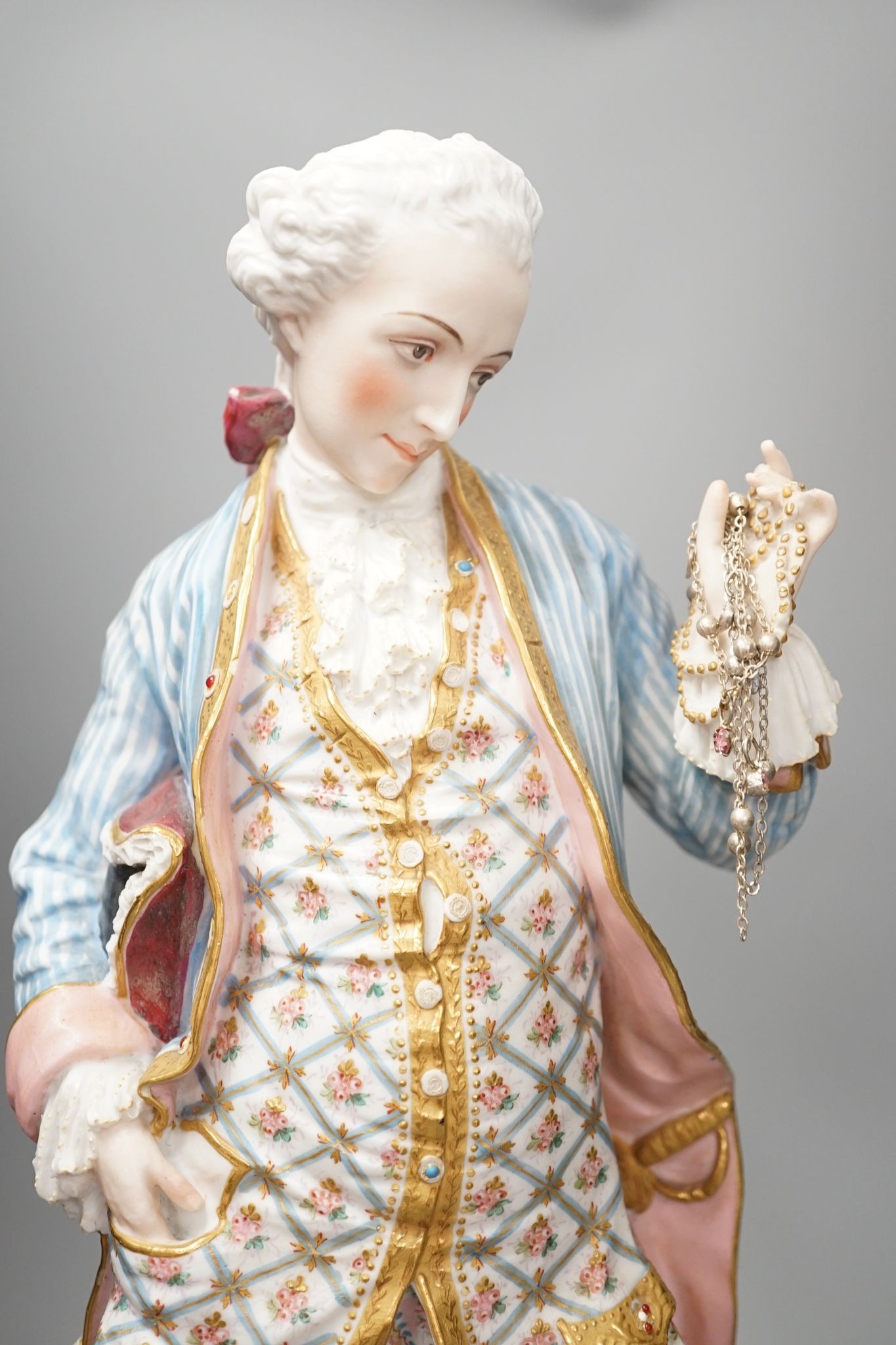 A large French coloured biscuit figure of a gentleman 42cm